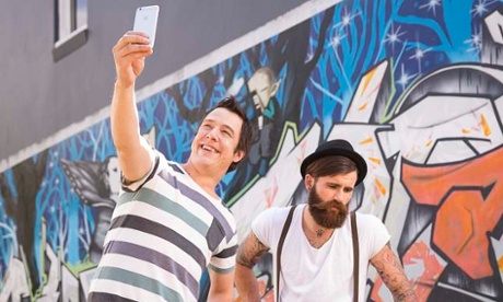  SBS television host Samuel Johnson snaps a selfie with a beard-loving hipster.