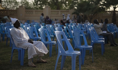 Members of Sudanese opposition parties take part during a sit-in at the headquarters of Umma, one of Sudan's biggest opposition parties.