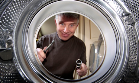 A washing machine drum with a repair man