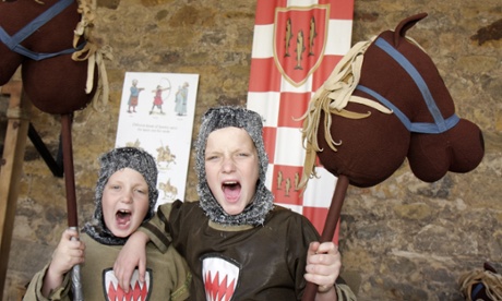 Dressing up as medieval knights at Alnwick Castle.