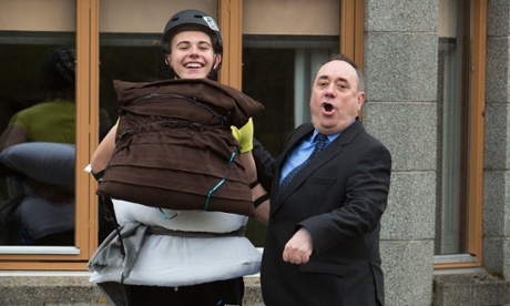 Touch down: Alex Salmond with 16-year-old Lewis Wilson, whom he dissuaded from leaping from his upstairs bedroom window on to a mattress.