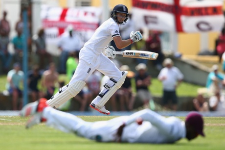 Joe Root plays a shot to the offside boundary as he matches Ian Bell with a half century.
