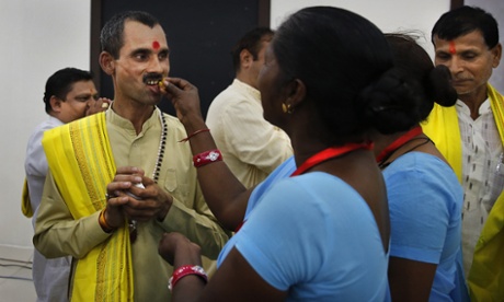 Dalit women at a ceremony to mark the eve of the birth anniversary of BR Ambedkar in New Delhi.