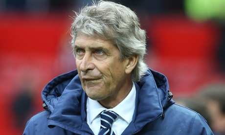 Manchester City manager Manuel Pellegrini walks off after the 4-2 defeat at Manchester United.