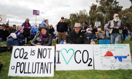 Anti-carbon tax protesters known as The Convoy of No Confidence listen to speeches in front of Parliament House in Canberra on August 22, 2011. The national convoy of disgruntled Australian truck drivers and farmers descended on Canberra to protest government policies including plans for a pollution tax.