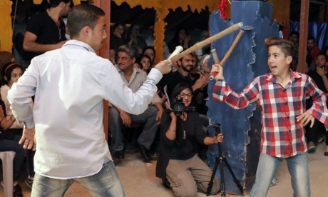 Two of the young performers in the makeshift theatre space.