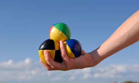 Woman holding juggling balls