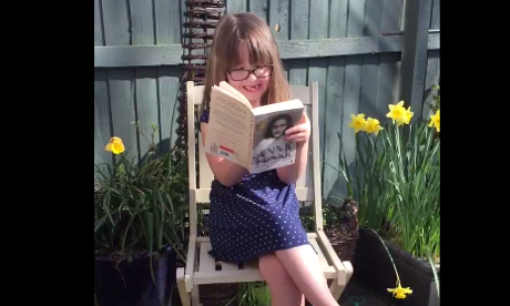 girl reads Anne Frank