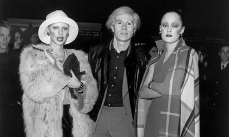 Memories of Andy Warhol, here flanked by two of his superstars, are featured in Brad Gooch's book about New York of the 1970s.