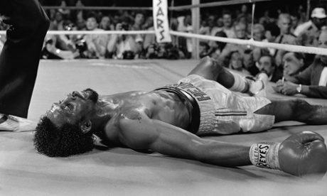Thomas 'Hitman' Hearns lies on the mat