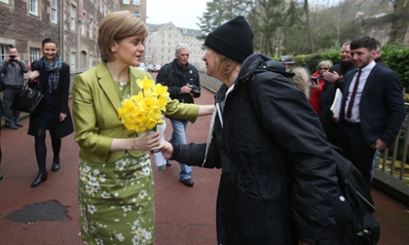 The SNP's Nicola Sturgeon is given a bunch of flowers while out on the campaign trail in Lanarkshire, Scotland.