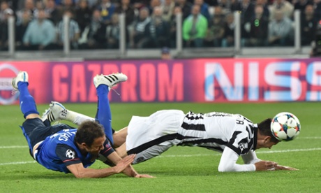 And he bundles over Alvaro Morata and the ref points to the spot.