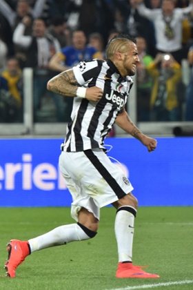 Arturo Vidal celebrates after scoring from the spot.