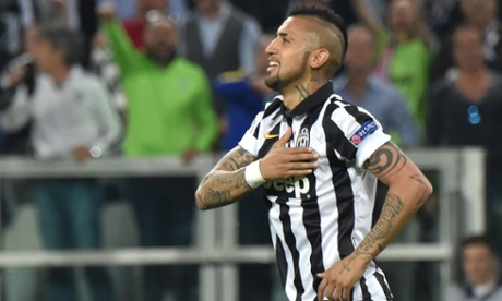 Juventus' Arturo Vidal celebrates after opening the scoring from the penalty spot.