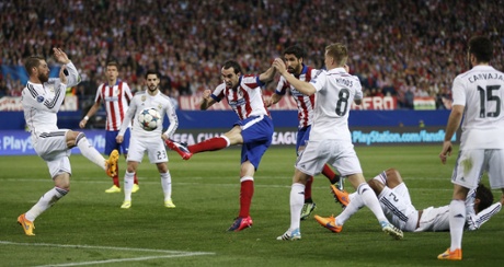 Atletico's Diego Godin can't keep his volley down.