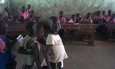 Primary one (P1) students lineup to have their school in Uganda