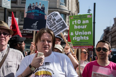 15 Apr 2015, London, England, UK --- London, United Kingdom. 15th April 2015 -- Ian Hodson, National President of the Bakers Union (BFAWU) joins protesters picketing the Marble Arch branch of Fast food giant McDonald's during the 'Hungry for Justice' global day of action campaigning for the minimum wage for fast food workers. -- Protesters picketed the Marble Arch branch of Fast food giant McDonald's during the 'Hungry for Justice' global day of action organised by Fast Food Rights, campaigning for workers at the fast food giant to be paid a living wage.