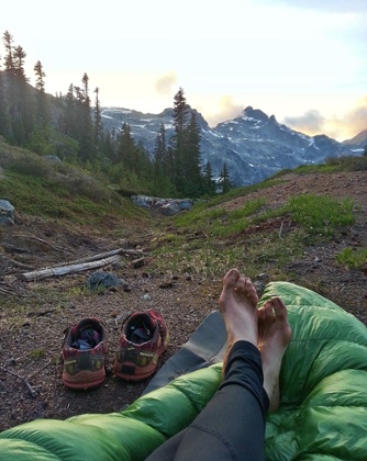 Feet at rest on the trail.