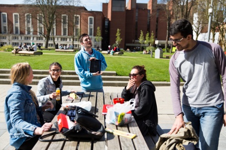 Student Union worker Tom Smith signs up students at the University of Manchester