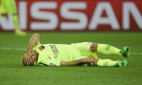 Javier Mascherano can't decide what hurts more, his head or his knee.