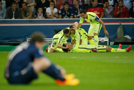 Luis Suarez rightly receives the congratulations of his team-mates after scoring the second goal for Barcelona.