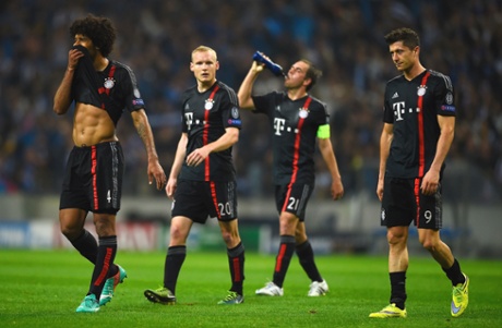 Bayern's Dante, Sebastian Rode and Robert Lewandowski look shellshocked as they leave the pitch.