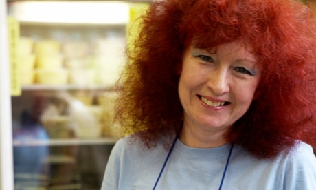 sally butcher holding a tray of food