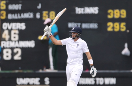 Joe Root celebrates his second half century of the match.