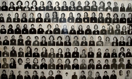 Photographs of genocide victims on the walls of the Tuol Sleng museum.