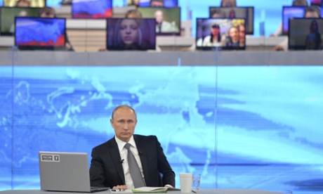 The Russian president, Vladimir Putin, takes part in a live call-in in Moscow.