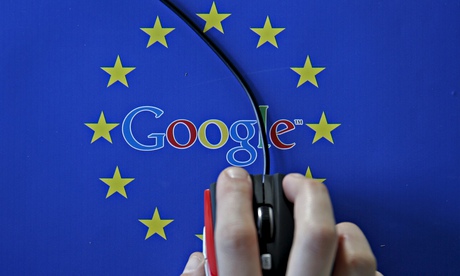 A woman hovers a mouse over the Google and European Union logos in Sarajevo