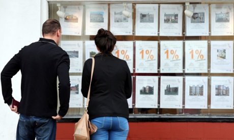 Couple at estate agents