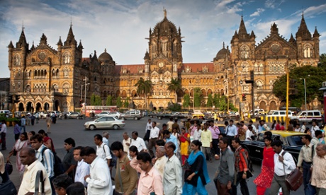 Commuters pour out of Chhatrapati Shivaji Terminus, at the southern end of Mumbai.