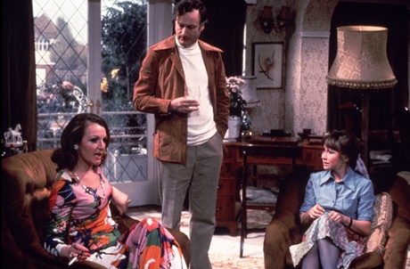 Jerry wears a white poloneck with aplomb