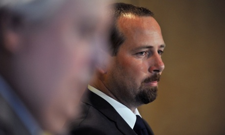Calm down, dear: Clive Palmer (left) with motoring enthusiast Ricky Muir.