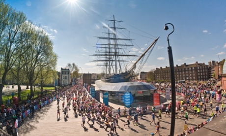 Marathon runners run around the Cutty Sark in Greenwich, London