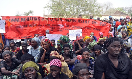 Parents of the still missing 219 Chibok schoolgirls gather on 14 April to mark the first anniversary of their abduction by Boko Haram.