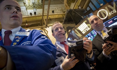 Traders in New York as markets slide,