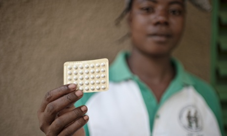 Aminata Bangaé is pictured with contraceptive pills at the Health and Social Promotion Centre of Moaga, Burkina Faso.
