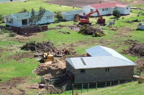 Before the project could begin, buildings and crops had to be demolished.