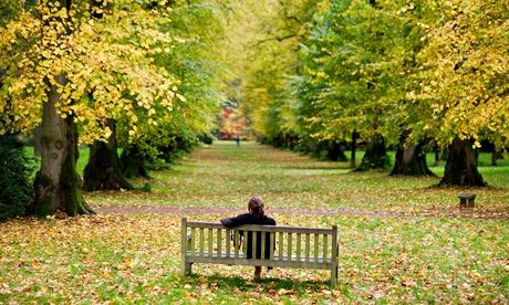 Woman sitting alone on a bench