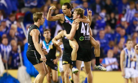 Port Adelaide celebrate Kane Mitchell's match-sealing goal (Scott Barbour/Getty Images)