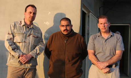Grim, center, in Iraq