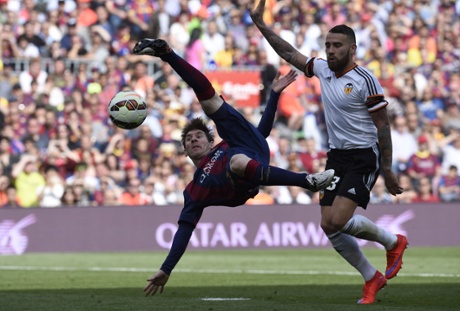 Lionel Messi kicks acrobatically against Valencia, he scored the second to seal the victory.