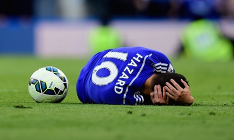 Eden Hazard of Chelsea goes to ground.