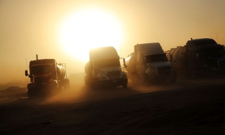 Oil trucks parked up near a fracking site in Odessa, Texas