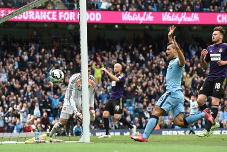 Sergio Aguero follows up as the ball bounces into the goal after a big deflection off James Collins.
