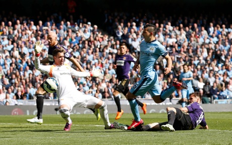 Carl Jenkinson gets a crucial touch on Sergio Aguero sending him into touch.
