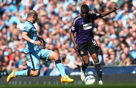 Pablo Zabaleta tackles Enner Valencia.