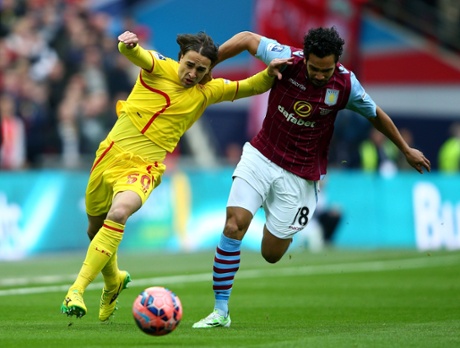 Lazar Markovic keeps ahead of Kieran Richardson.